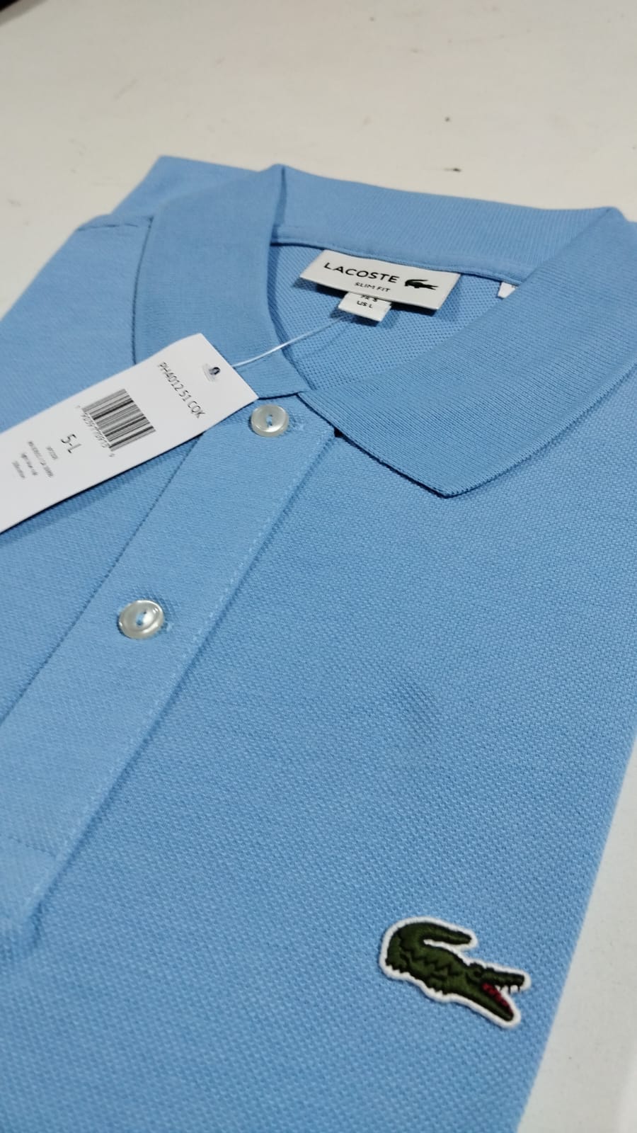 Camisero original Lacoste celeste bebé